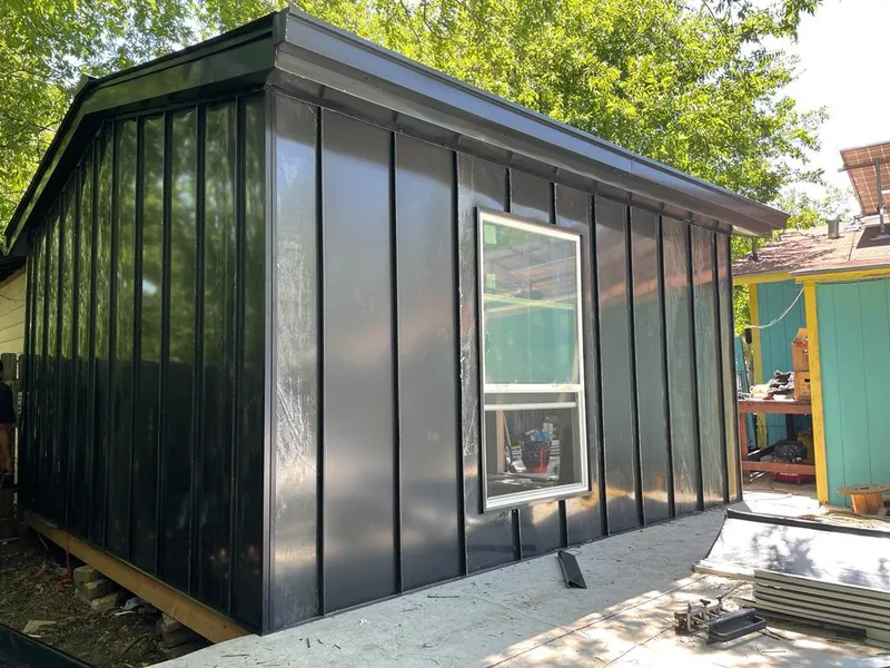 Black standing seam metal wall panels for Metal Roof Installation in Fate